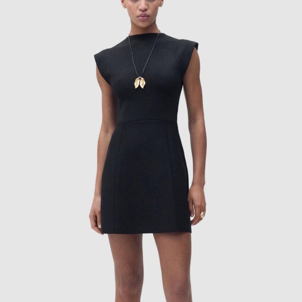 MNG: Dominó Peplum Mini Dress